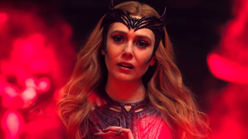 elizabeth olsen as wanda scarlet witch looking sad at alternate universe orbs in doctor strange in t