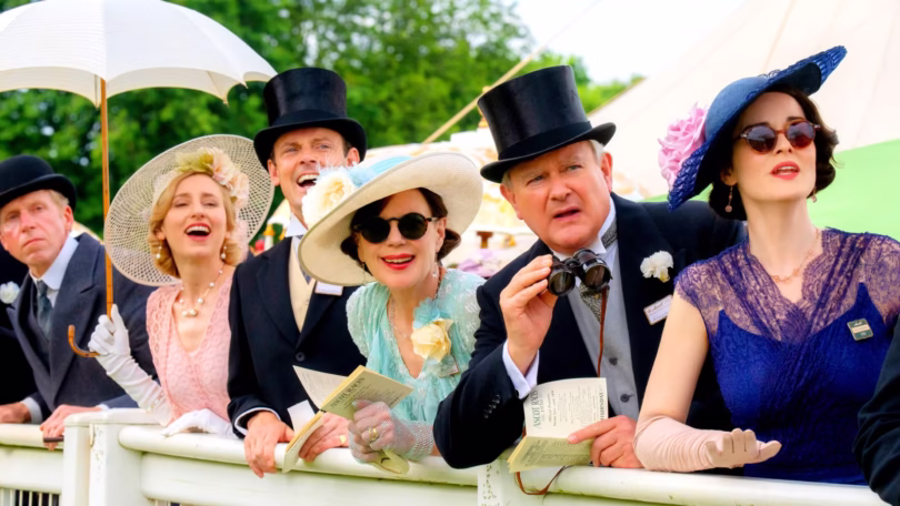the crawleys all nicely dressed and cheering at an event in downton abbey the grand finale edited.jp