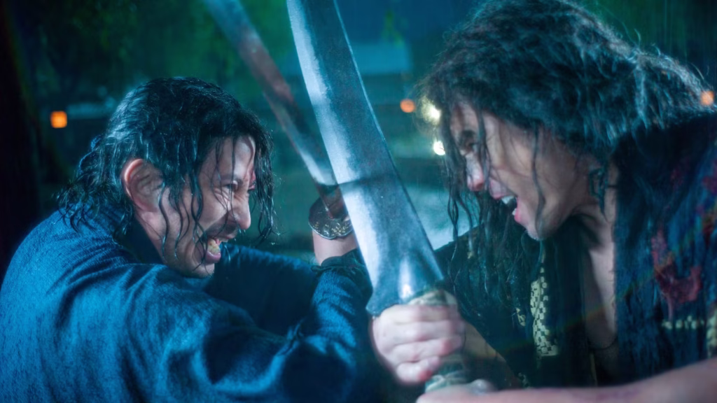 junichi okada s shujiro clashing swords with hideaki ito s bukotsu while in the rain in last samurai