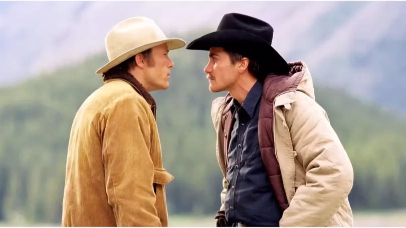 ennis del mar heath ledger and jack twist jake gyllenhaal angrily staring at each other in brokeback